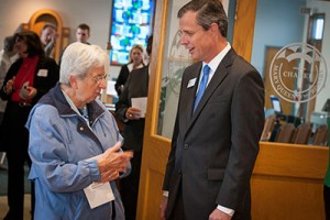 Sister Agnesmarie LoPorto, converses with Notre Dame College President Thomas Kruczek outside the chapel after the blessing ceremony.